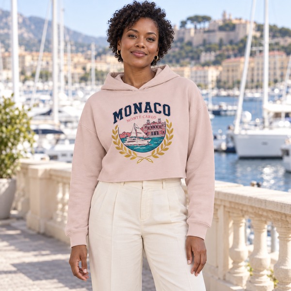 A cropped hoodie in a marina setting